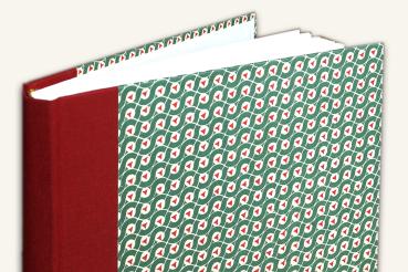 Photo album, red linen spine, green cover, geometric pattern, small triangles, white, red